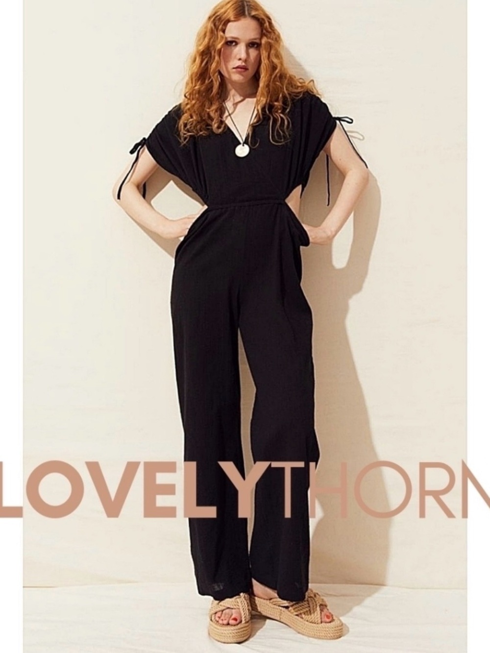 H&M Black Wide-Leg Jumpsuit with Tie Sleeve Details